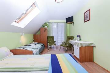 Фото номера Трехместный номер с балконом Проживание в семье Villa Ula г. Поберово 6