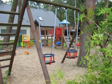 Фото номера Семейные апартаменты с 2 спальнями Дома для отпуска Nasza Chata - 4 minuty od plaży г. Поберово 69