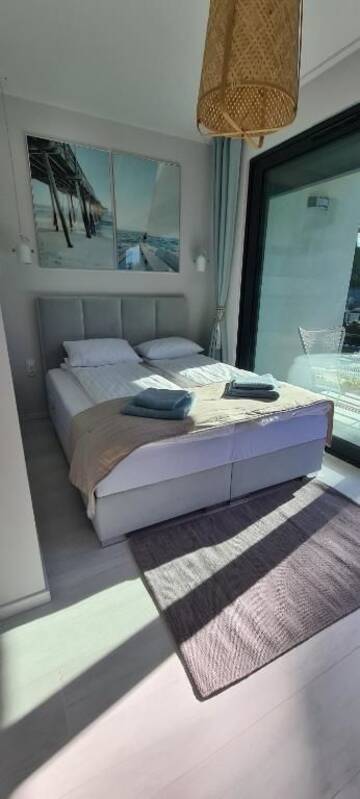 Фото номера Дом с 2 спальнями Дома для отпуска BOHO MARE Apartament Pobierowo г. Поберово 71