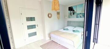 Фото номера Дом с 2 спальнями Дома для отпуска BOHO MARE Apartament Pobierowo г. Поберово 59